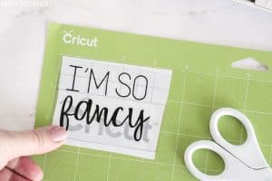 Cricut vinyl 'I'm So Fancy' with transfer tape over it
