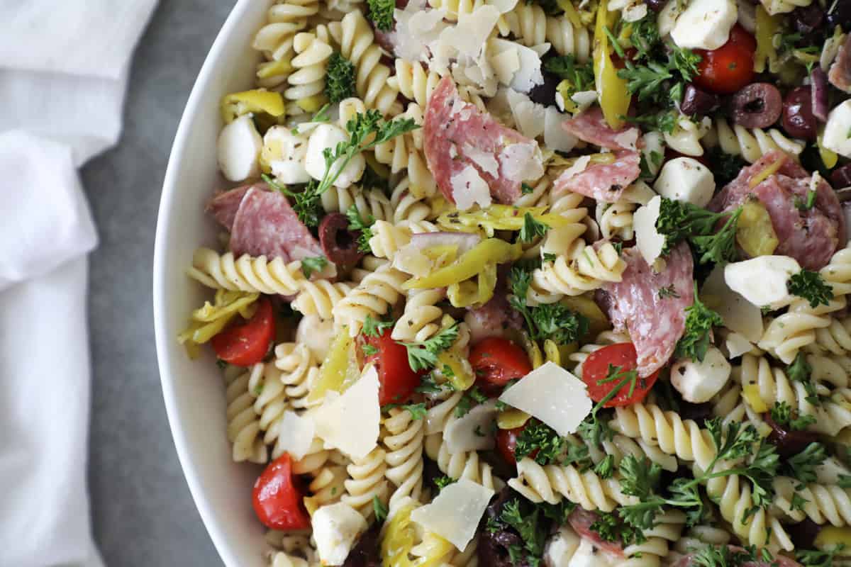 close up of pasta salad in a white bowl