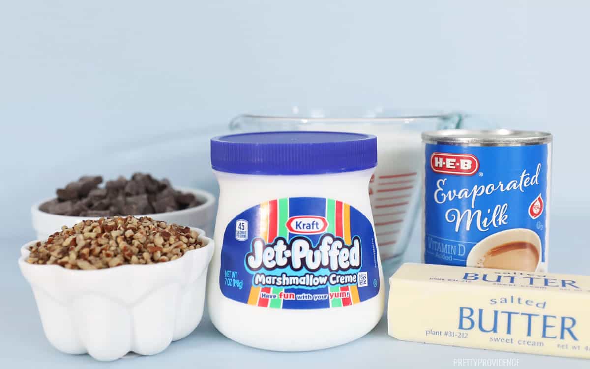 Marshmallow Creme jar, pecans and other fantasy fudge ingredients in bowls