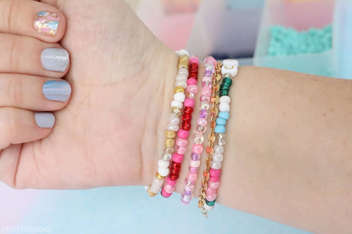 Taylor Swift friendship bracelets on a wrist